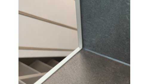 Schodová lišta - bočnice Küberit 279 U 9,2*7*3050 Imitace nerezi F2G
