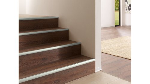 Schodová lišta pro obložení schodů Küberit 325, 21,5*2700 Imitace nerezi F2